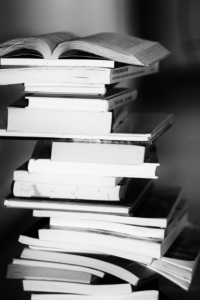 a stack of books in black and white